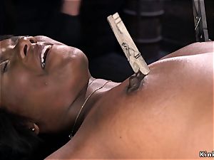 huge ebony butt flogged in implement bondage